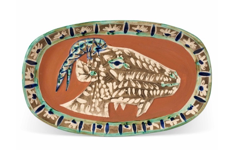 Tete de chevre de profil (A.R. 146) - partially glazed white earthenware oblong dish with colored engobes by Pablo Picasso (Spanish, 1881-1973), conceived in 1952